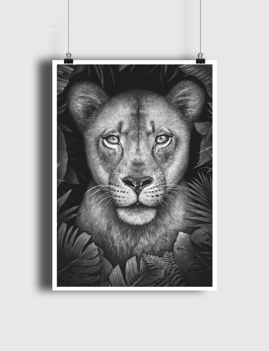 Lioness in tropical leaves